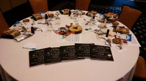 A picture of our heavily gifted tables at our events! We LOVE our sponsors! 